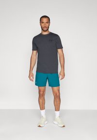 Under Armour VANISH SHORTS - Sportske kratke hlače - dunkelgrün