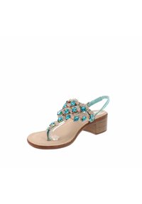 Sandal beige con tacco a blocco basso e dettagli in strass blu. Caratterizzato da un design a infradito con una cinghia decorativa e cinturino alla caviglia regolabile.
