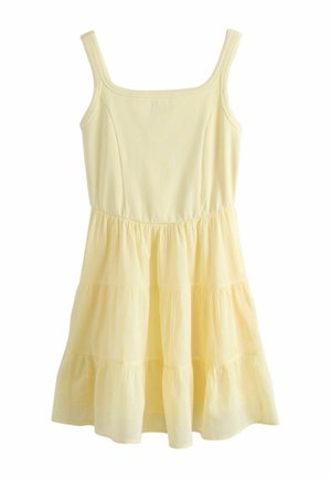 Rochie de vară galben deschis, fără mâneci, cu corset strâmt, tip reiat și fustă vaporoasă cu volane, decolteu pătrat, confecționată din material ușor.