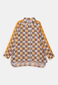 Långärmad skjorta med ett flerfärgat geometriskt mönster och orange detaljer samt krage. Låg passform med rundad fåll.