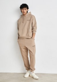 AllSaints UNDERGROUND HOODY - Kapucni - toffee taupe
