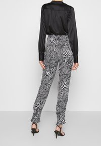 The Kooples Tygbyxor - black