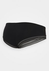 Bas de bikini noir en tissu extensible, avec une finition lisse et une bande décorative rayée sur les côtés, agrémentée de dentelle.