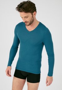 Damart COL V FINE SENSITIVE MANCHES LONGUES - Maglietta intima - bleu pétrole
