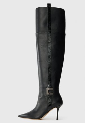 High heeled boots - nero