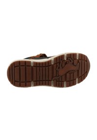 Semelle noire avec semelle extérieure en caoutchouc marron, présentant des rainures horizontales et un logo de cheval. Design de texture antidérapante avec bords renforcés.