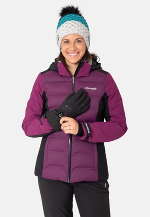 Purple and black insulated jacket with a hood, featuring a zip closure. Black gloves with a buckle, and a multicolored knitted hat.