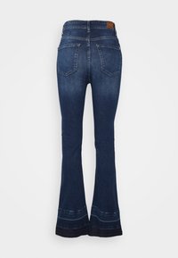 Dark blue denim flared jeans with a high waist, featuring two back pockets and a distinct hem detail with a contrasting band.