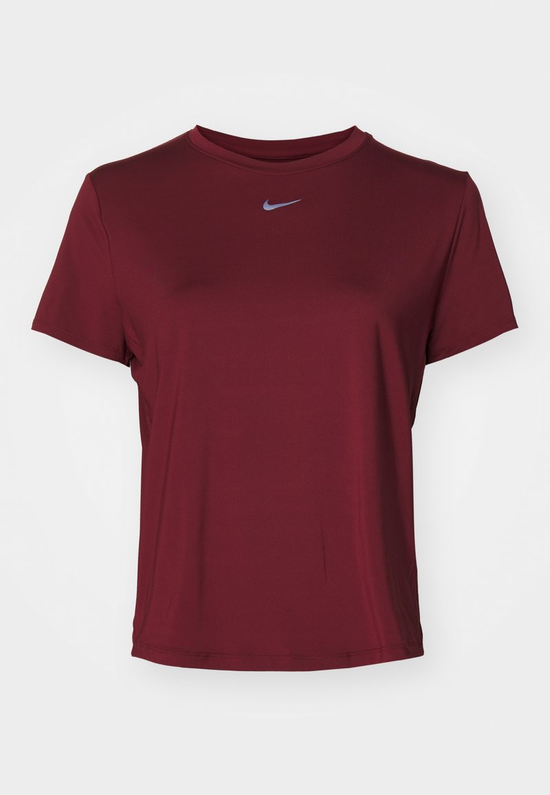 T-shirt à manches courtes bordeaux en tissu lisse, avec un col rond et un petit logo Nike gris sur la poitrine.