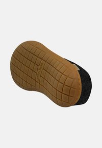 Black felt slipper with a rubber sole, featuring a textured, honeycomb pattern for grip. The sole is beige with a rounded shape.