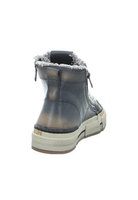 Dunkelblauer Leder-Stiefelette mit grauem Fellfutter, seitlichem Reißverschluss und profilierter Gummisohle. Verfügt über einen kontrastierenden strukturierten Absatz und ein Logo.