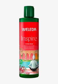 Bouteille en plastique verte de crème de douche Weleda avec étiquette rouge, illustrée de grenades, volume de 400 ml, et un bouchon à clapet.