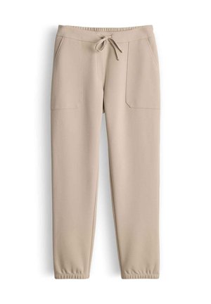 Beige joggers gemaakt van zachte stof, met een elastische tailleband met trekkoord, zijzakken en taps toelopende boorden bij de enkels.