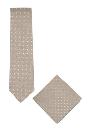 Beige stropdas en bijpassend pochet met kleine witte stippen op een witte achtergrond.