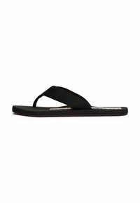 Infradito neri con una fascia testurizzata e una suola piatta in gomma. Presentano un design minimalista senza loghi o motivi visibili.