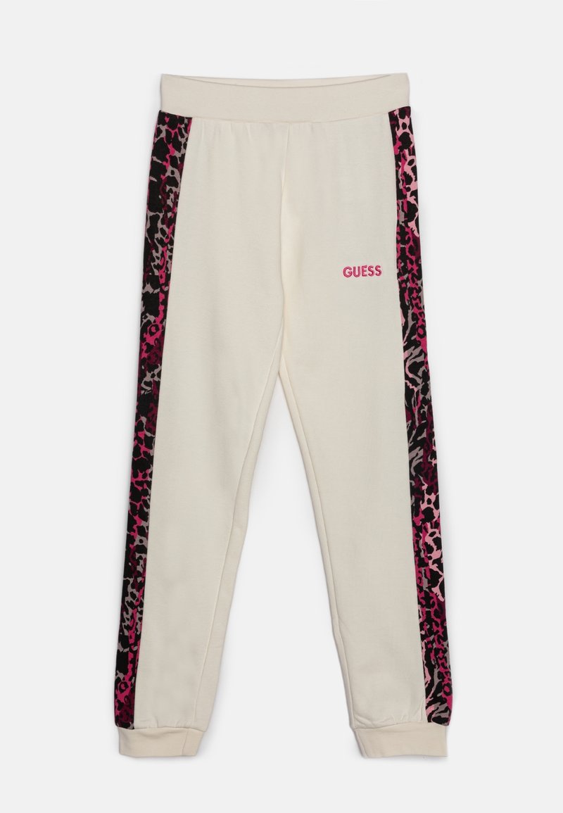 Cremefarvede sweatpants med pink leopardmønstrede sidestriber. Har elastisk talje og manchetter. "GUESS" logo i pink på fronten.