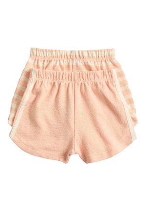 Deux paires de shorts doux et élastiques à taille pour enfants en tons pêche ; un uni avec des rayures blanches, un rayé pêche et crème.