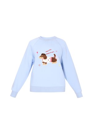 Jasnoniebieska bluza z grafiką brązowego psa trzymającego różowy balon, napis "Mino Pop Happy Puppy" oraz wzorem w kropki. Miękki materiał, dekolt w stylu crew neck.