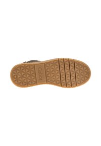 Suela de zapato de goma marrón con un patrón texturizado de diamantes y surcos horizontales. Presenta la marca "Gabor" cerca del talón.