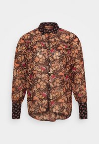 Long-sleeve blouse in sheer brown fabric featuring a multicolored floral pattern and a black printed collar with button closures.