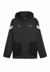Zwarte windbreakerjas met een capuchon, voorzien van groene accentstrepen, gaas zijzakken en logo's op de borst en mouw.