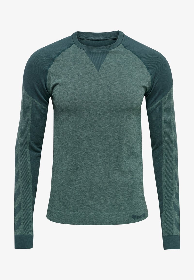 Pitkähihainen urheilupaita tummanvihreästä heather-kankaasta. sisältää vaaleampia vihreitä yksityiskohtia hartioissa ja sivuilla sekä teksturoidun kankaan ja ribbausta kauluksessa.