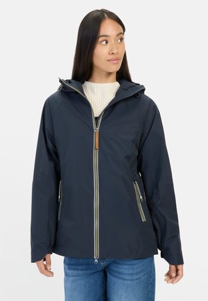 Navy waterproof jacket with a zip front and adjustable hood, featuring side zippers and a textured light-colored inner lining.