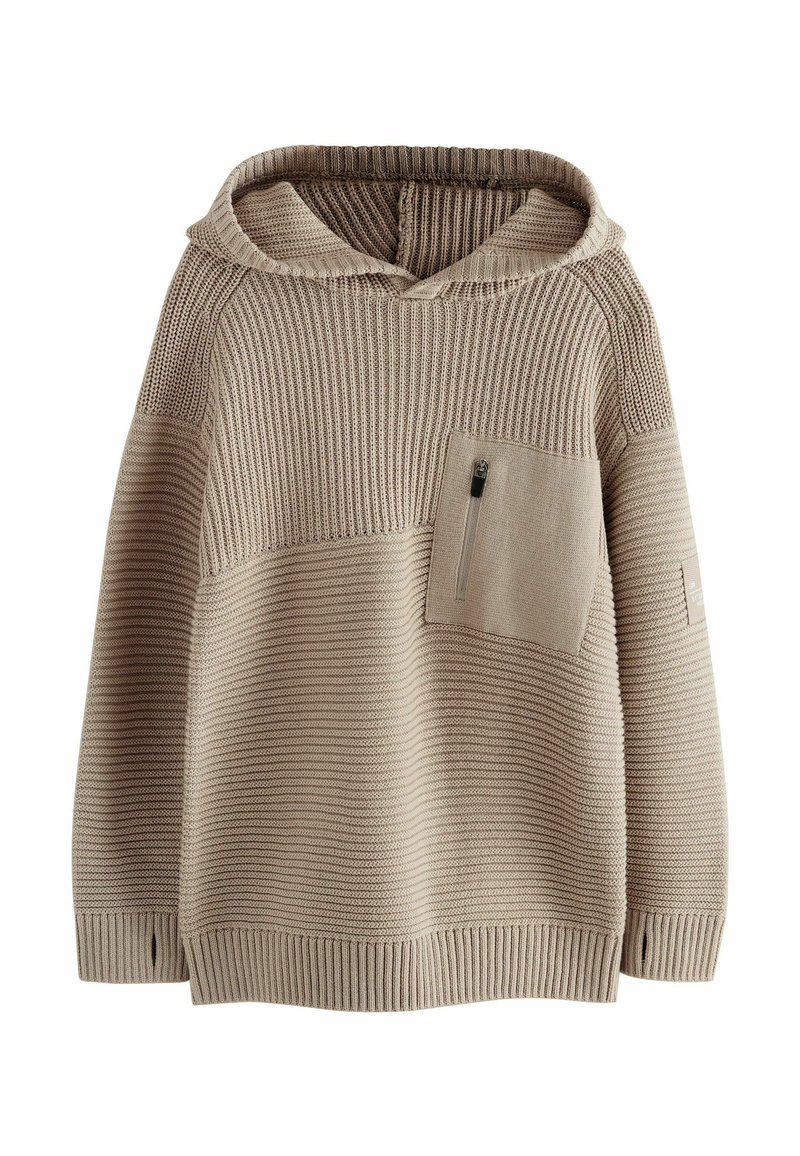 Haut à capuche en tricot beige avec une poche avant, présentant une texture côtelée et des coutures de panneaux. Comprend une capuche et des fentes sur les côtés à l'ourlet.