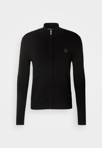 Black zip-up cardigan in a smooth knit fabric. Features a high collar, long sleeves, and a small brand logo on the chest.