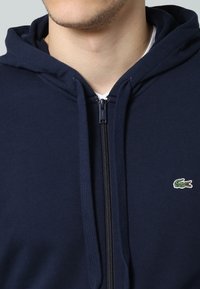 Lacoste Tröja med dragkedja - dark blue