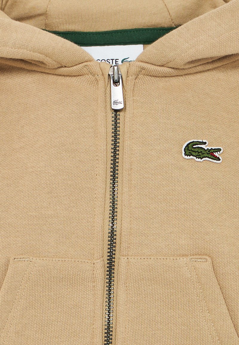 Lacoste PREMIER SET Sudadera con cremallera viennois/beige