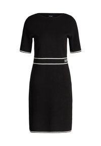 Μαύρο πλεκτό φόρεμα με κοντά μανίκια, με λευκή οριζόντια ρίγα στη μέση και λευκές λεπτομέρειες στα μανίκια, κατασκευασμένο από απαλό ύφασμα.