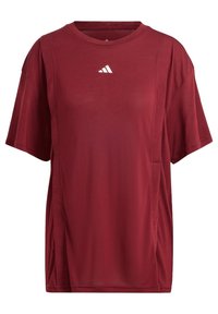 Camiseta deportiva color marrón burdeos con mangas cortas, escote redondo y logo blanco. Presenta un corte relajado y una textura de tejido suave, además de contar con un bolsillo en la costura lateral.