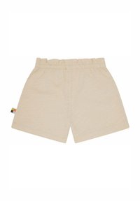 Pantaloni corti in cotone beige con vita elastica arricciata. Finitura piatta con bordi orlati e un'etichetta del marchio multicolore sul lato.