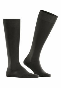 Schwarze knielange Socken aus einem glatten, dehnbaren Material. Mit einem gerippten Bündchen an der Oberseite für einen guten Sitz und Unterstützung.