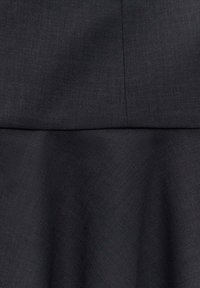 Black fabric featuring a smooth, textured surface; structured top with a flared bottom. Includes seam details and a subtle sheen.