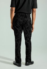 Next Chino - black
