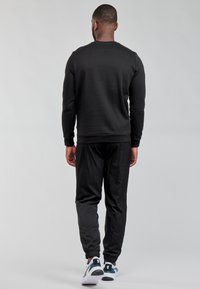 Puma FD ESSENTIAL LOGO CREW FL - Felpa - puma black cat