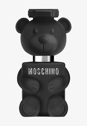 Black matte teddy bear-shaped bottle with silver "MOSCHINO" logo on chest and a rectangular cap on its head.