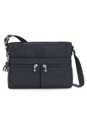 Navy shoulder bag with fabric exterior, two front zip pockets, circular logo, and adjustable strap. Features a monkey keychain accessory.