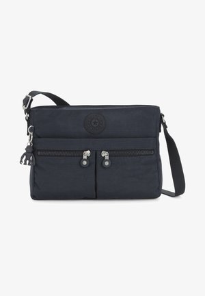 Navy shoulder bag with fabric exterior, two front zip pockets, circular logo, and adjustable strap. Features a monkey keychain accessory.