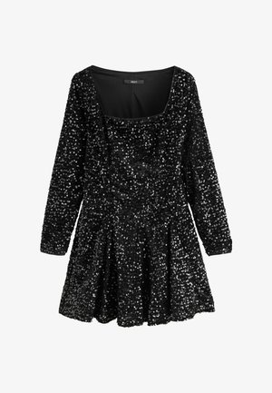 Musta pitkähihainen mekko, joka on peitetty paljeteilla, neliökaula-aukolla ja levenevällä helmalla. Sujuva pinta, tiukka yläosa ja kerroksellinen muotoilu.