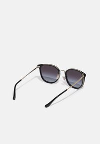 COACH Óculos de sol - light gold-coloured/black
