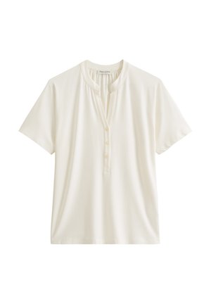 Korte mouwen, crèmekleurig T-shirt van zacht materiaal, met een ronde halslijn, knoopsluiting en een relaxte pasvorm. Gladde textuur overal.