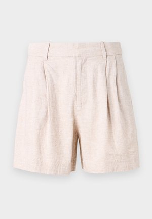 Shorts beige din in, cu o croială lejeră, având pliseuri în față, buzunare laterale și o textură netedă. Design simplu, fără modele.