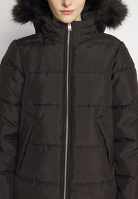 JDY JDYELI SUNNY LONG PADDED  - Casaco de inverno - black