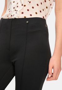 Marc Cain FREDERICA - Trousers - black