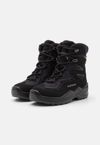Black hiking boots with a mix of suede and textile material. Features a curved design, rubber sole, and distinct lacing system.