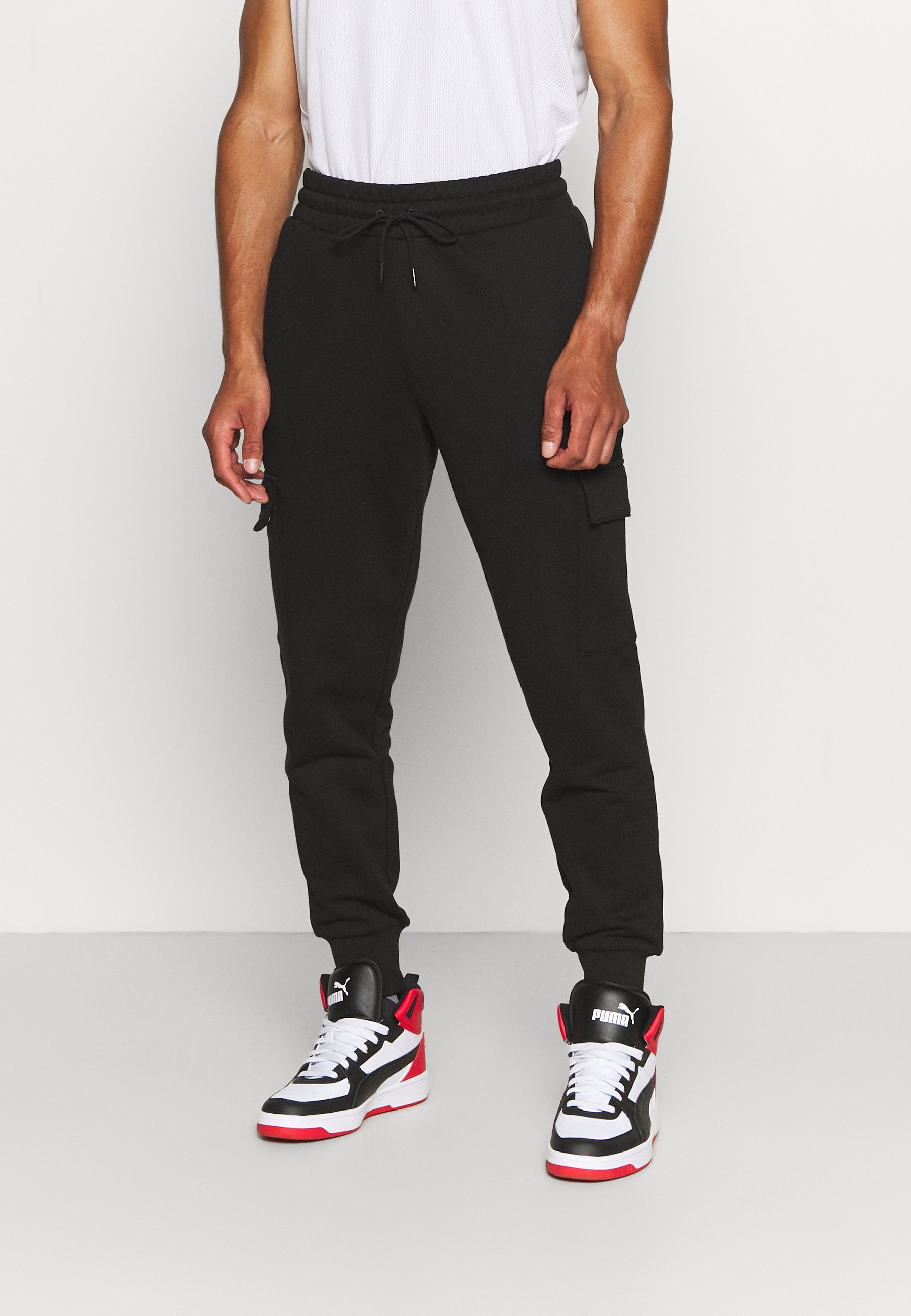 Puma BOOSTER PANT - Pantalones deportivos - black/negro - Zalando.es