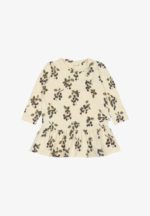 Vestido de manga larga en color crema con una falda fruncida, que presenta un estampado de bayas y hojas en verde oscuro y negro. Hecho de una tela suave.